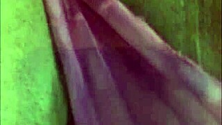 Beautiful latina masturbates with dildo in her room.