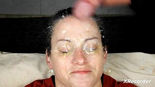Brunette amateur receives bukkake facial with dirty talk