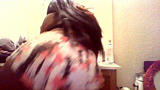 Young Dancer Moves Playfully in Bathroom to Thug's Tune