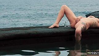 Does free spirit girl squirt by the shore?