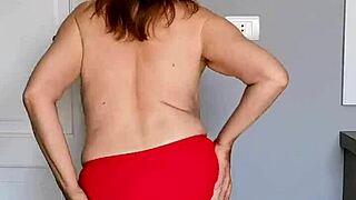 Mature woman fingers her hot shaved pussy up close, natural tits heaving during homemade masturbation