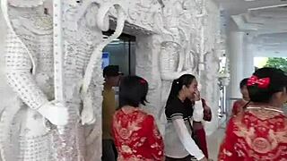 seeing chiang rai through big buddha statue temple thailand