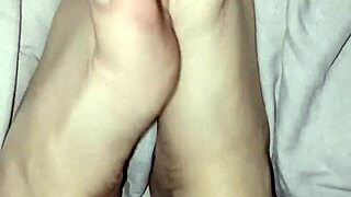 Gretala showcases her natural bare feet without any polish in a simple display