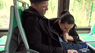 young brunette fucks in a bus while a voyeur watches her big tits