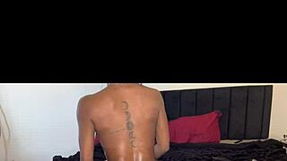 Ebony babe takes her time oiling up her smooth skin in this relaxing clip