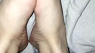 Gretala showcases her natural bare feet without any polish in a simple display