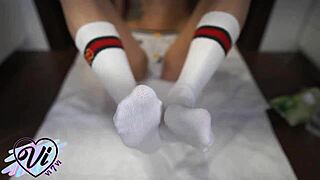 Brunette Shows Her Feet and Tattoo Closeup.