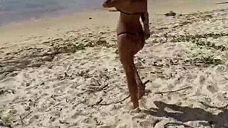 Monika Fox Poses in Pink Bikini on Beach