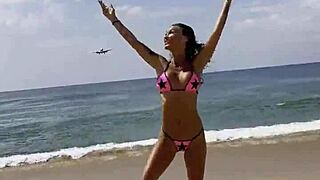 Monika Fox Poses in Pink Bikini on Beach