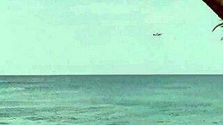 Monika Fox Poses in Pink Bikini on Beach