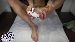 Brunette Shows Her Feet and Tattoo Closeup.