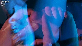 I'm up close sucking and licking Artemis's sweaty big tits and toes.