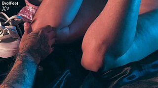 I'm up close sucking and licking Artemis's sweaty big tits and toes.