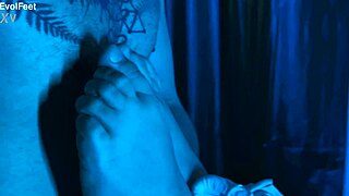 I'm up close sucking and licking Artemis's sweaty big tits and toes.