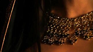 brunette in her black dress looking mature and sexy