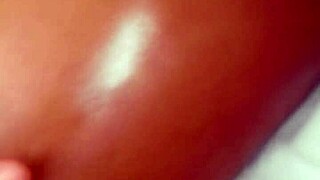 Oil massage turns sensual for big booty ebony wife