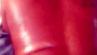 Oil massage turns sensual for big booty ebony wife