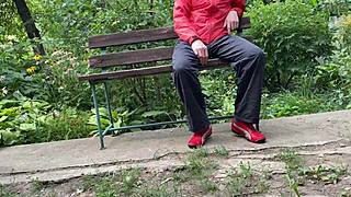 Hot Milf Jerks Big Dick Into Glass On Park Bench