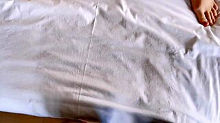 Tattooed beauty plunges a dildo inside of her?