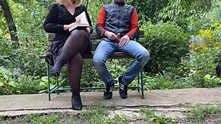 curvy woman satisfies guy outdoors in public