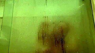 Manager spies on naked milf in shower.