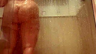 Manager spies on naked milf in shower.