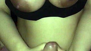 Watch this wife with big tits giving an amazing handjob