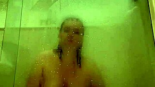 Manager spies on naked milf in shower.