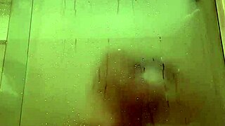 Manager spies on naked milf in shower.