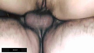 bent over in sauna with black fishnets