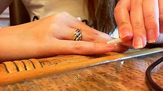 In this ASMR video, long nails caress sexy hands and nails sensually