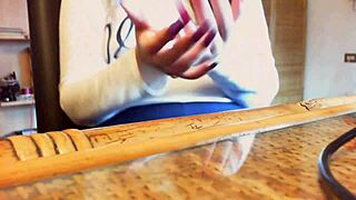 In this ASMR video, long nails caress sexy hands and nails sensually