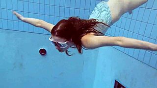 Petite Russian Star Libuse Teases with Tiny Assets and Underwater Charm