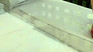 Lisa flashing on the balcony in lingerie with tattoos