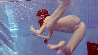 Petite Russian Star Libuse Teases with Tiny Assets and Underwater Charm