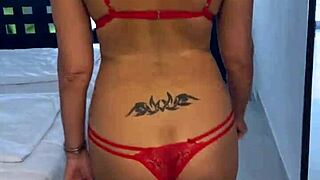 Lisa flashing on the balcony in lingerie with tattoos