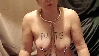 humiliated slave indulges in piss and belt self-session