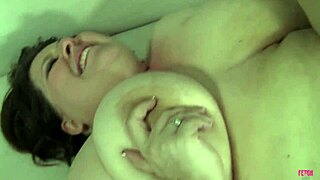 a smiling bbw caresses her hairy pussy as a skinny guy gives her his big cock