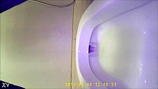 asian teen 18+ pees in toilet