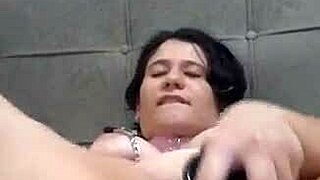 Young woman uses toys and enjoys showing to her man and others