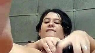 Young woman uses toys and enjoys showing to her man and others