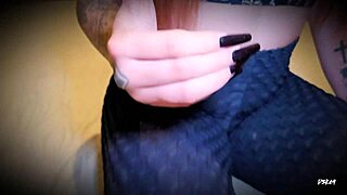 Horny redhead masturbates realistic sex doll to orgasm.