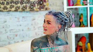 Anal slut spreads gaping asshole with extreme dildos and fisting action