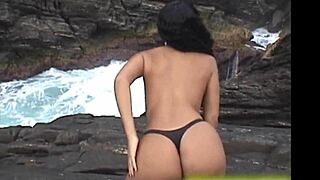 i feel a mix of excitement and nervousness as the african tourist pays me 200 reais to film my naked body in buzios rj