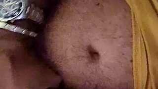 Aline, the beautiful blonde milf, gives a passionate handjob to Flavio, making him orgasm with a cumshot before bedtime