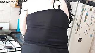 Girlfriend pleasures pussy in kitchen while dinner cooks