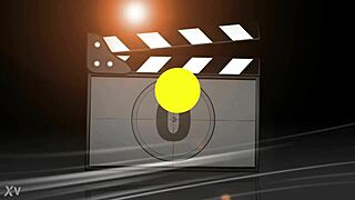 Behind the scenes, a brunette babe teases with a dildo.