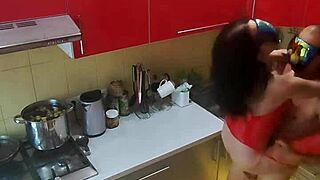 hidden cam captures rough kitchen scenes with mature milf