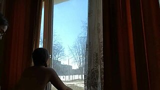 Helga Bosk engages in risky sex by the window as people walk by.