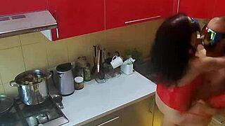 hidden cam captures rough kitchen scenes with mature milf